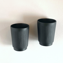 Load image into Gallery viewer, Black Ceramic Tumbler Cup with Ribbed Texture. Artifact Home www.artifacthome.ca