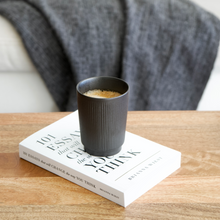 Load image into Gallery viewer, Black Ceramic Tumbler Cup with Ribbed Texture. Artifact Home www.artifacthome.ca