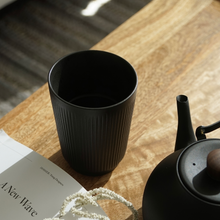Load image into Gallery viewer, Black Ceramic Tumbler Cup with Ribbed Texture. Artifact Home www.artifacthome.ca