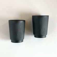 Load image into Gallery viewer, Black Ceramic Tumbler Cup with Ribbed Texture. Artifact Home www.artifacthome.ca
