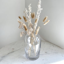 Load image into Gallery viewer, Artifact Home www.artifacthome.ca Mouth blown and handblown round clear glass vase home decor with bunny tails, baby&#39;s breath and ruscus leaves 

