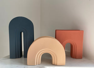 Artifact Home www.artifacthome.ca Ceramic arch vase in terracotta, beige, navy blue for home decor