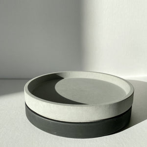 Artifact Home www.artifacthome.ca  Black and grey round concrete tray minimalist home decor